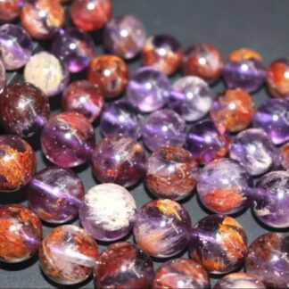 Améthyste à inclusions de Goethite (Cacoxénite ou Super Seven)