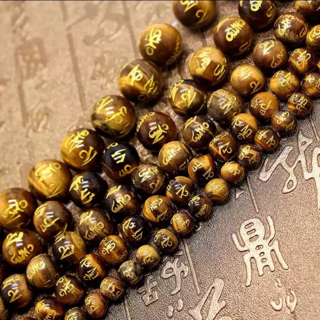 Œil de tigre (gravé signe chinois doré)