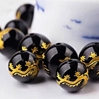 Séparateur synthétique perles noires avec dragon doré